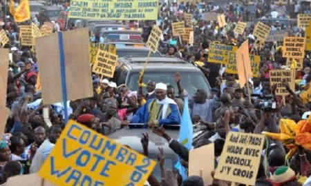 Senegal's leader Abdoulaye Wade, facing