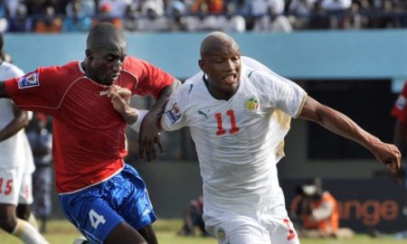 El-hadji-Diouf-battles-with-Mathew-Mendy-in-Gambia’s-1-1-draw-with-Senegal-in-Dakar