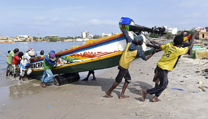 Retour après la pêche au port de Soumbedioune à Dakar, le 2 juillet 2015 / AFP/Archives