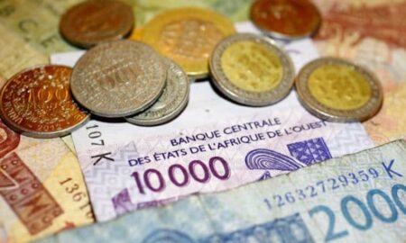 Pièces de monnaie et billets de banque FCFA