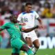 Kalidou KOULIBALY et Jude Bellingham, lors de la rencontre SÉNÉGAL Angleterre